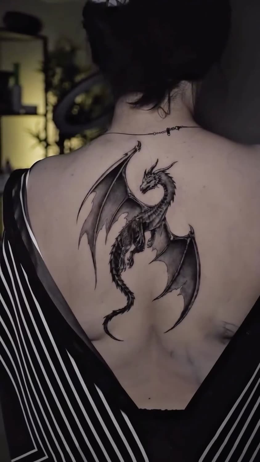 Dragon back piece tattoo
