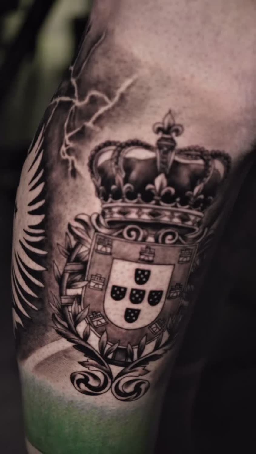 Crown and crest black and grey tattoo