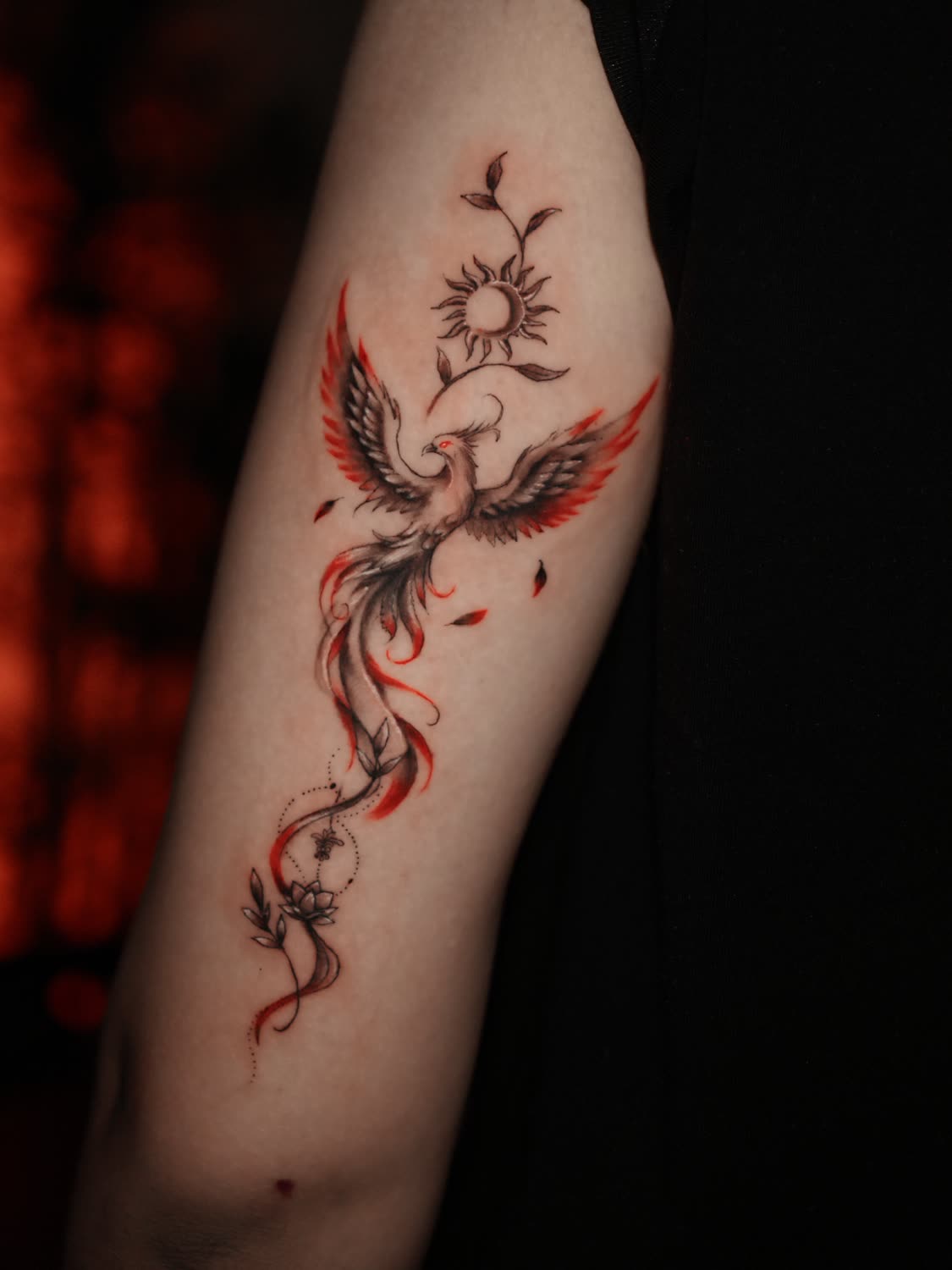 Fine-line phoenix with red ink by Sahil Verma