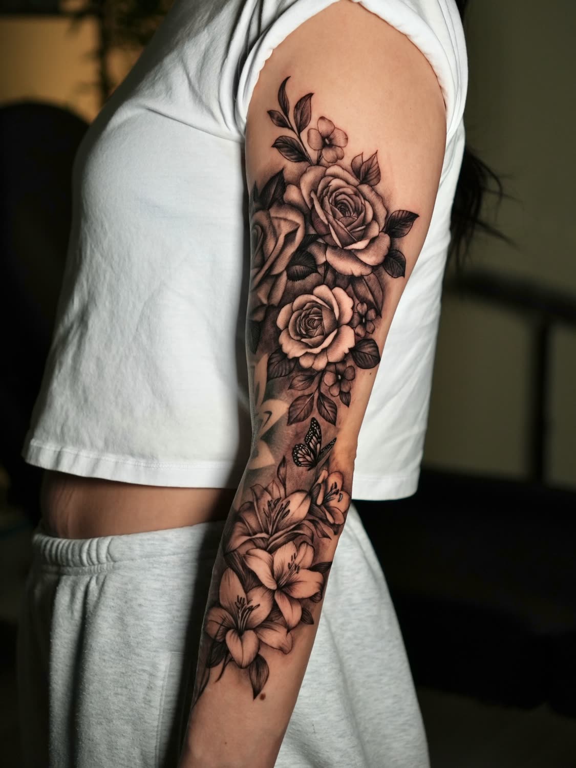 Rose and lily forearm sleeve with butterfly, fine line